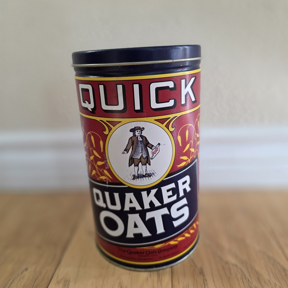 Large Size Antique Quaker Oats Quick Oats Tin. Nine Inches Tall.